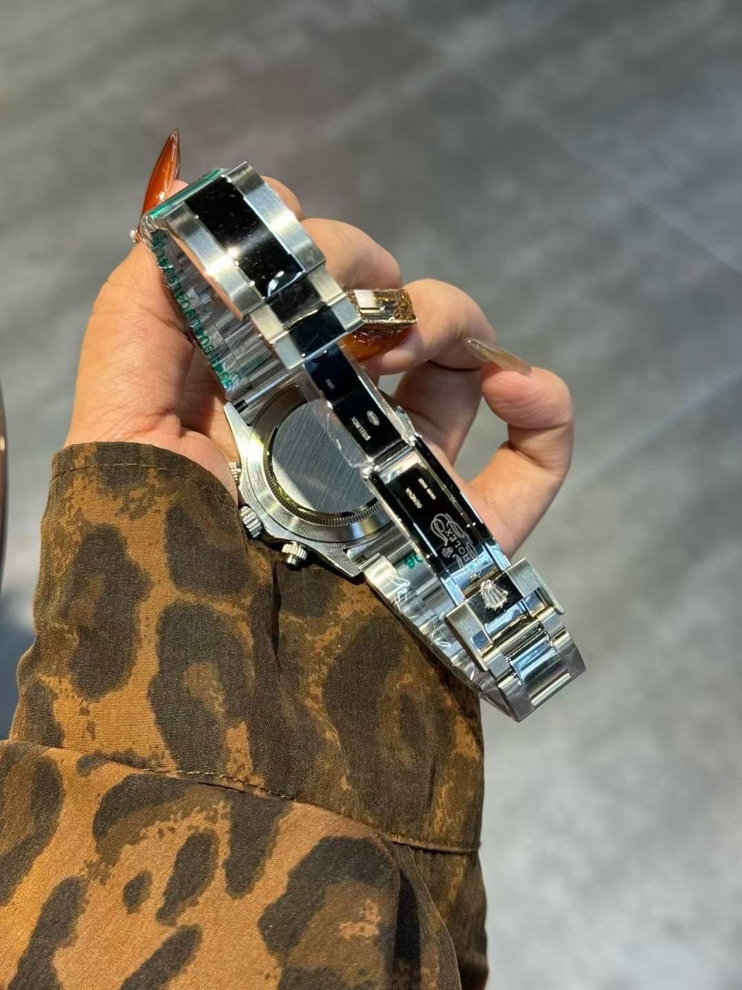 Rolex Silver Rose Gold Watch — back