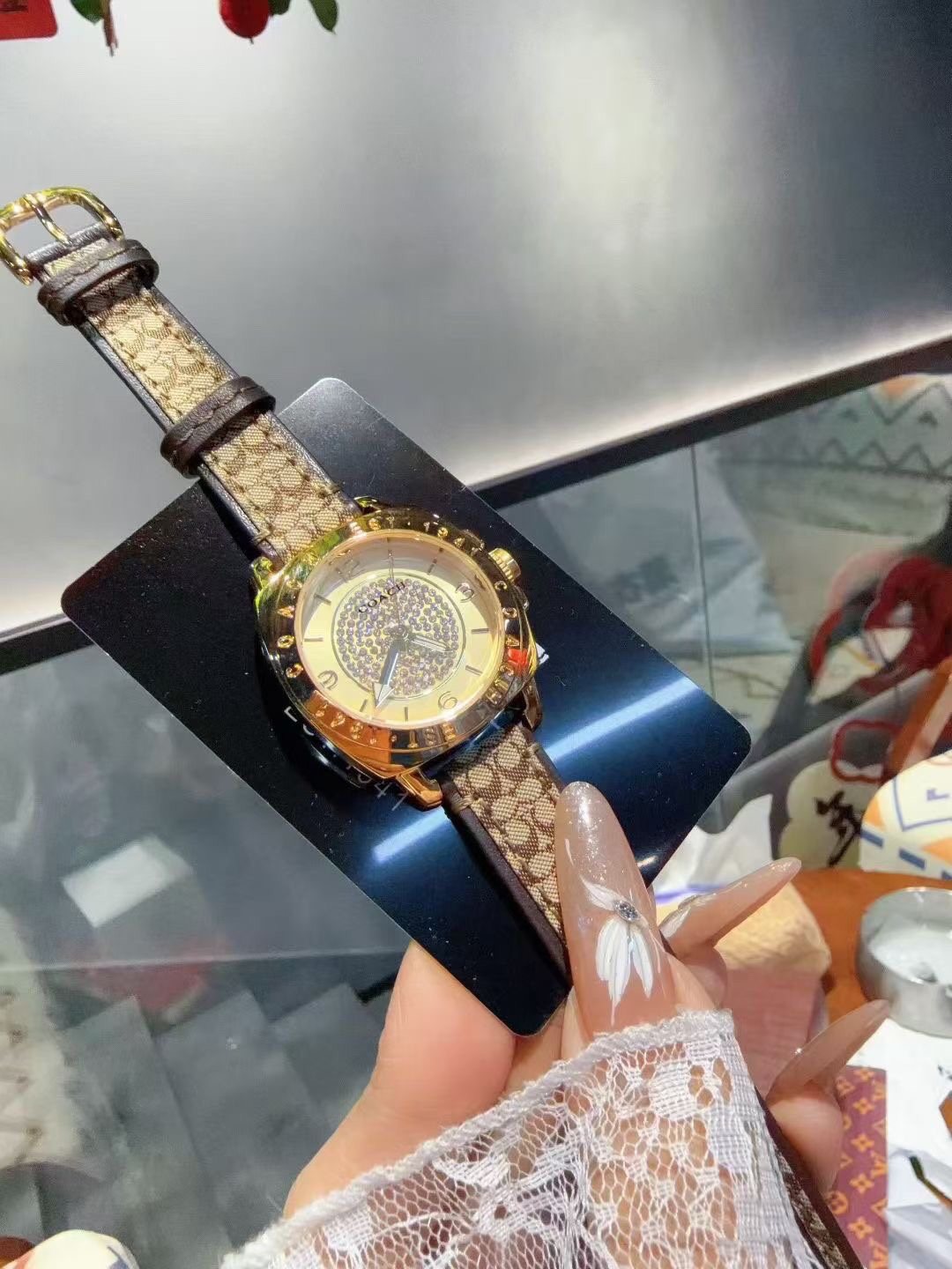 Coach Gold-Tone Patterned Strap Watch — front